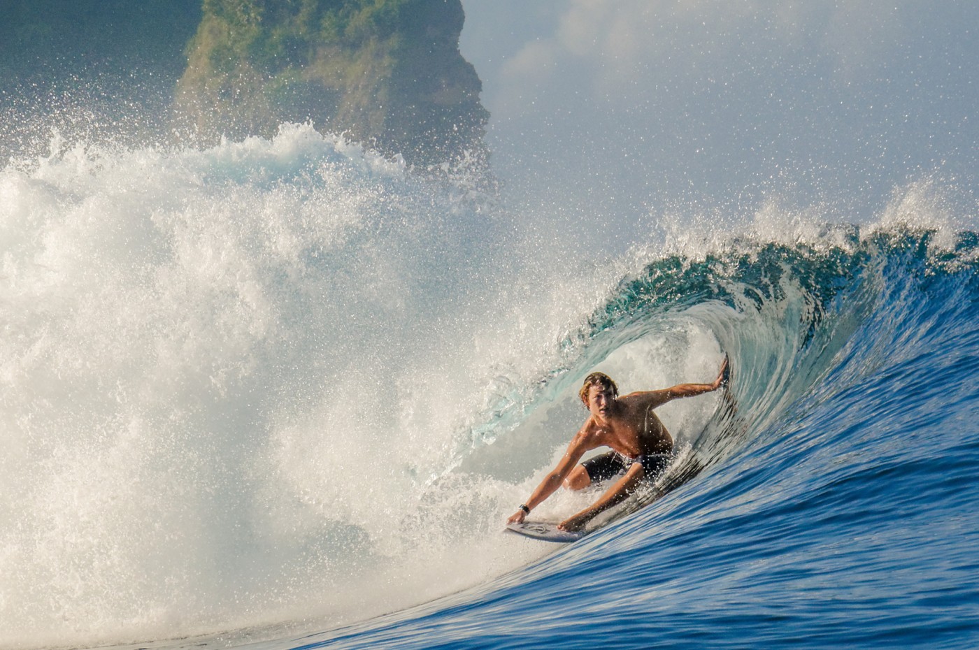 surfer at NIHI Sumba, Indonesia