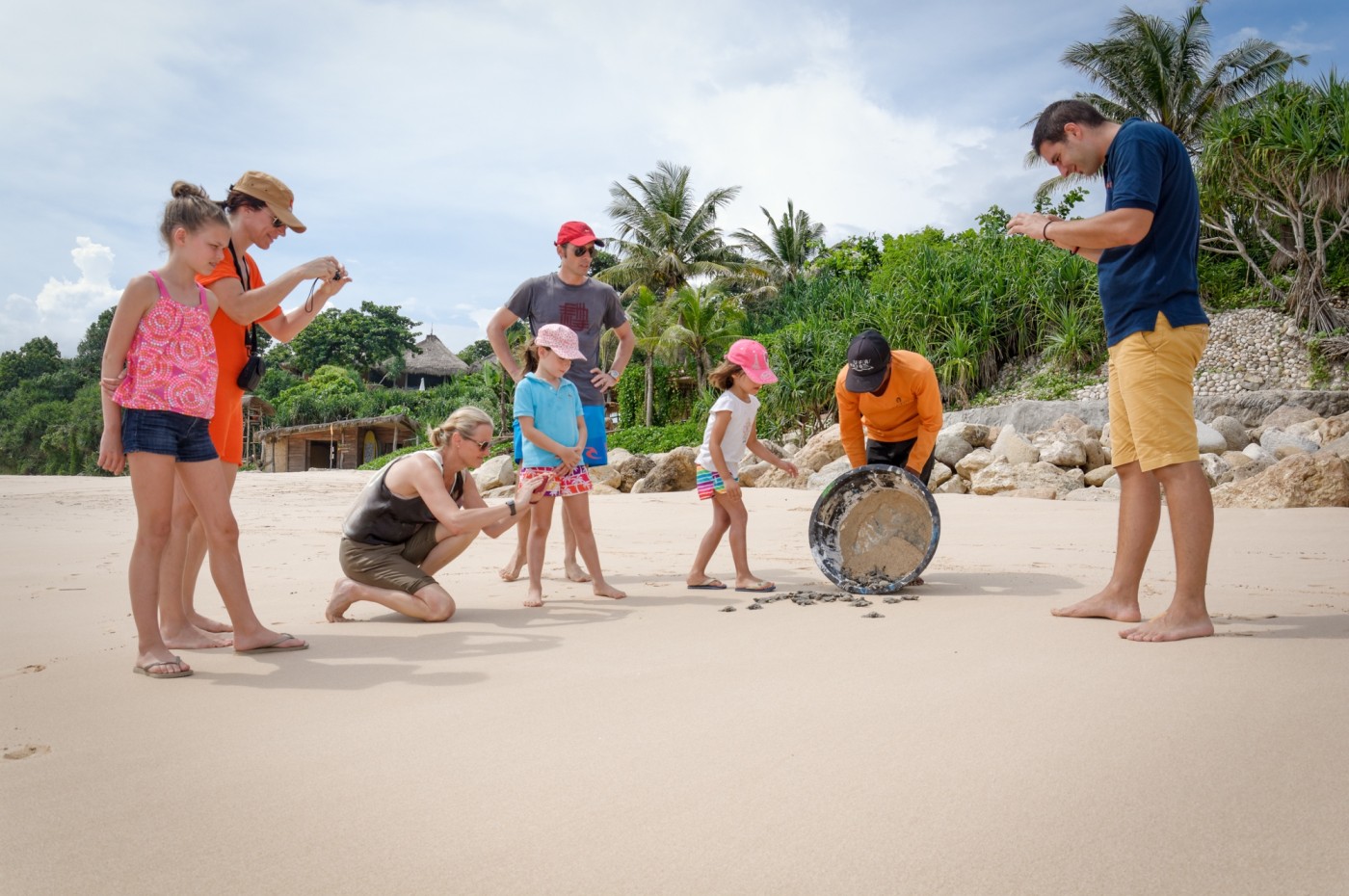 turtle release and family at the beach at NIHI Sumba, Indonesia