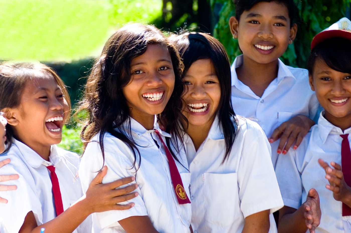 smiling local girls at Nikoi Island, Indonesia