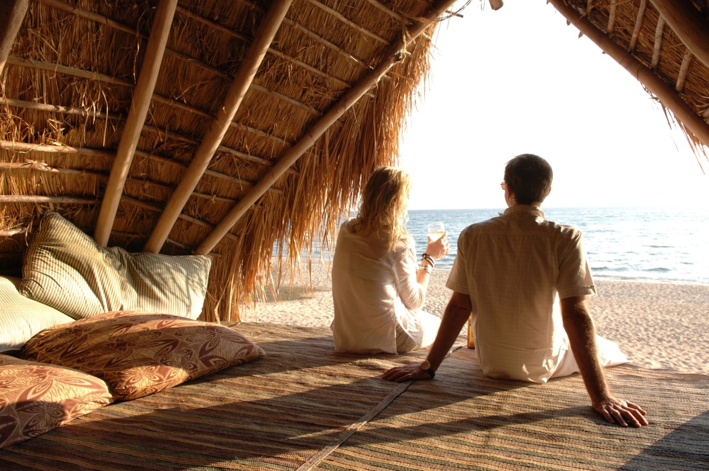 two people looking at the view over the lake at Greystoke Mahale, Tanzania