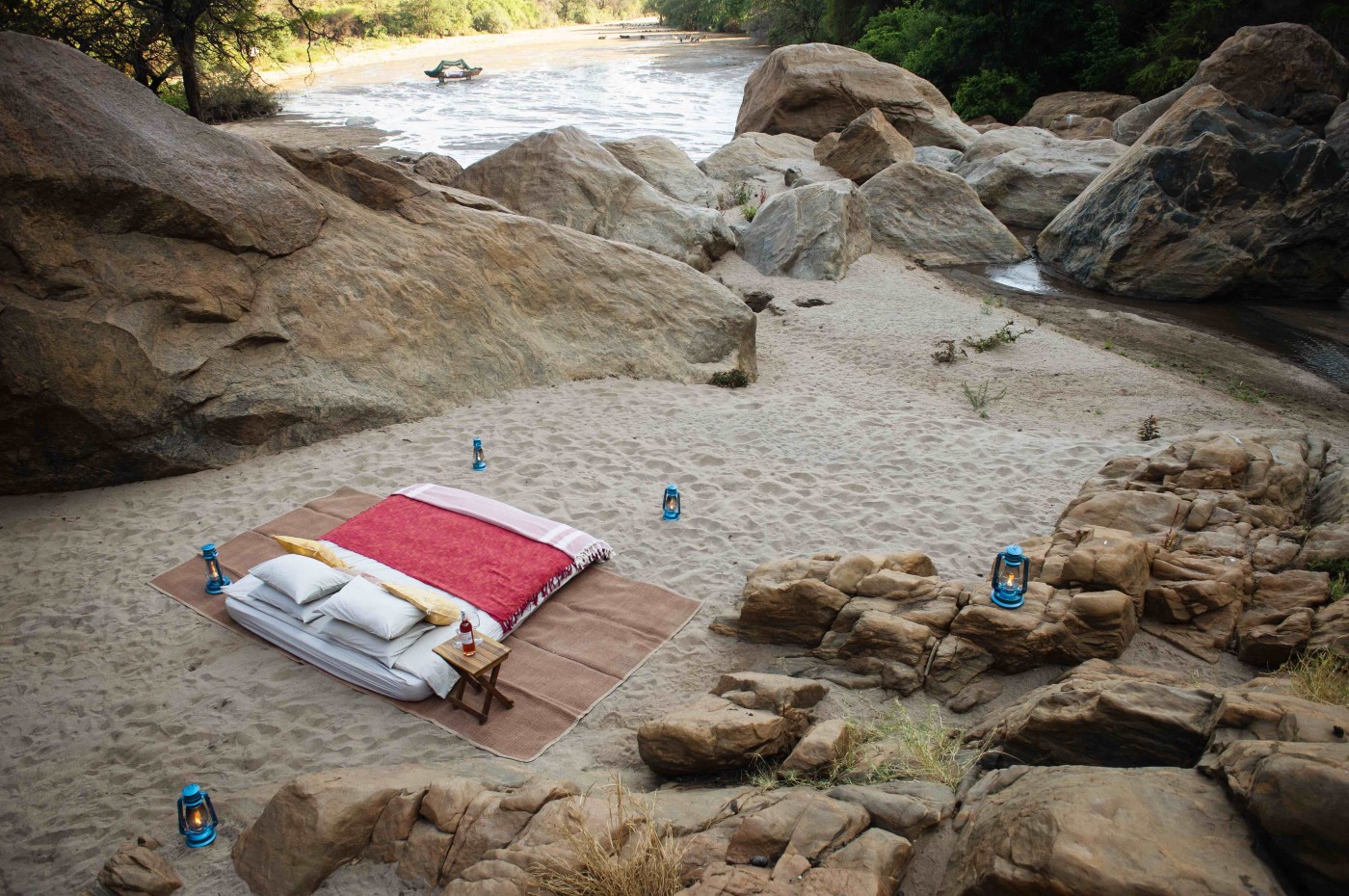 bed in the sand at Wayo Manyara Green Camp, Tanzania