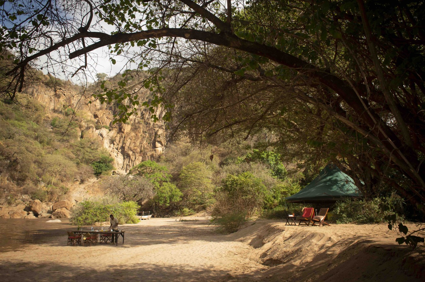camp and dinner table in nature at Wayo Manyara Green Camp, Tanzania