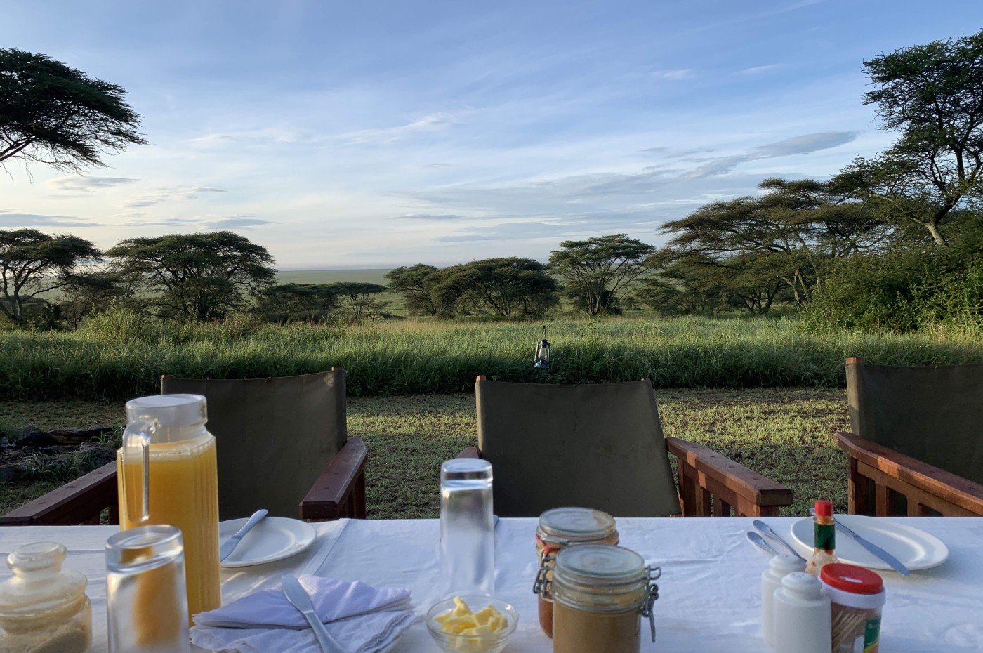 set table in the bush at Wayo Serengeti Green Camp, Tanzania