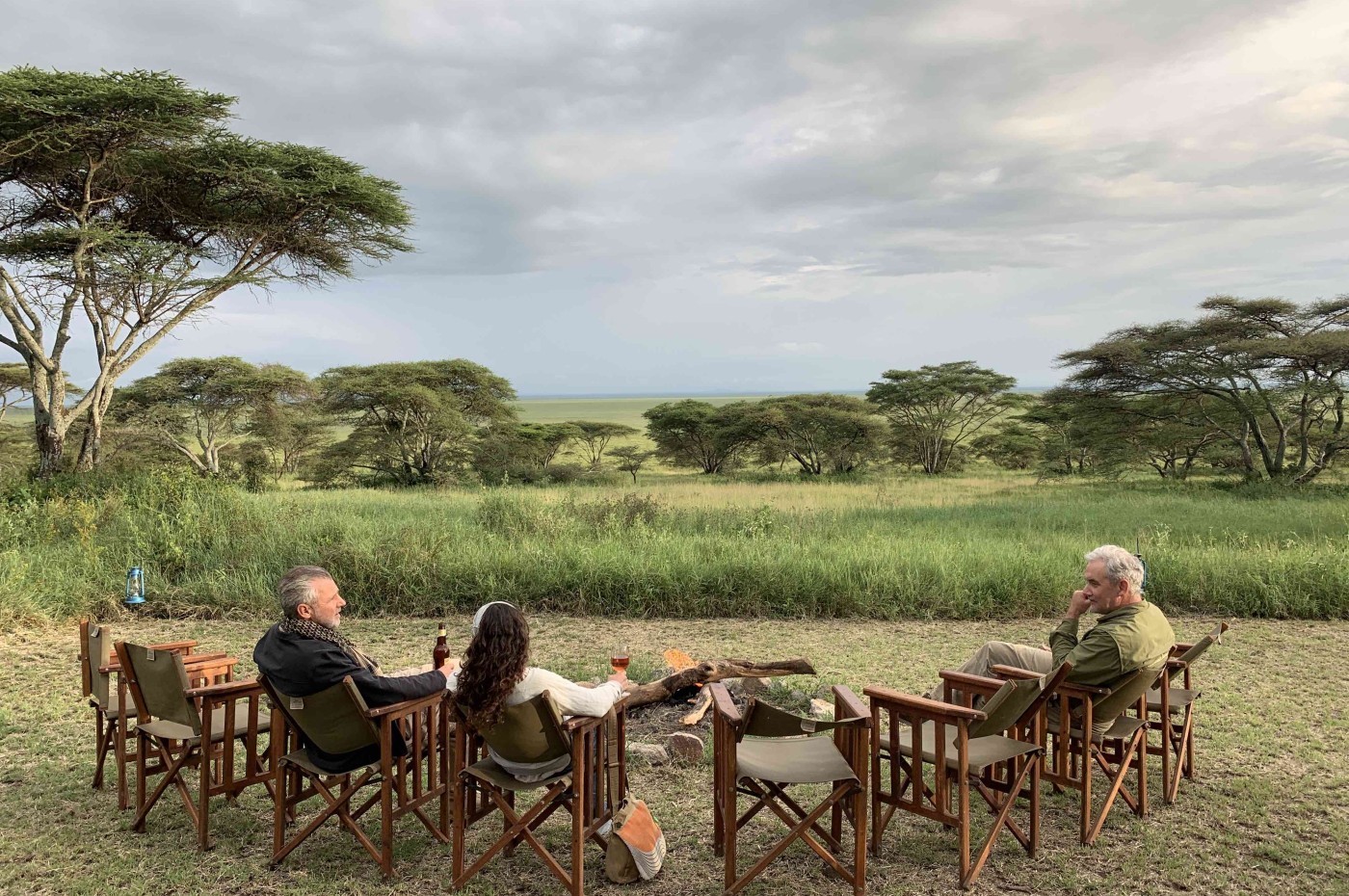 Bonfire and sundowners at Wayo Serengeti Green Camp, Tanzania