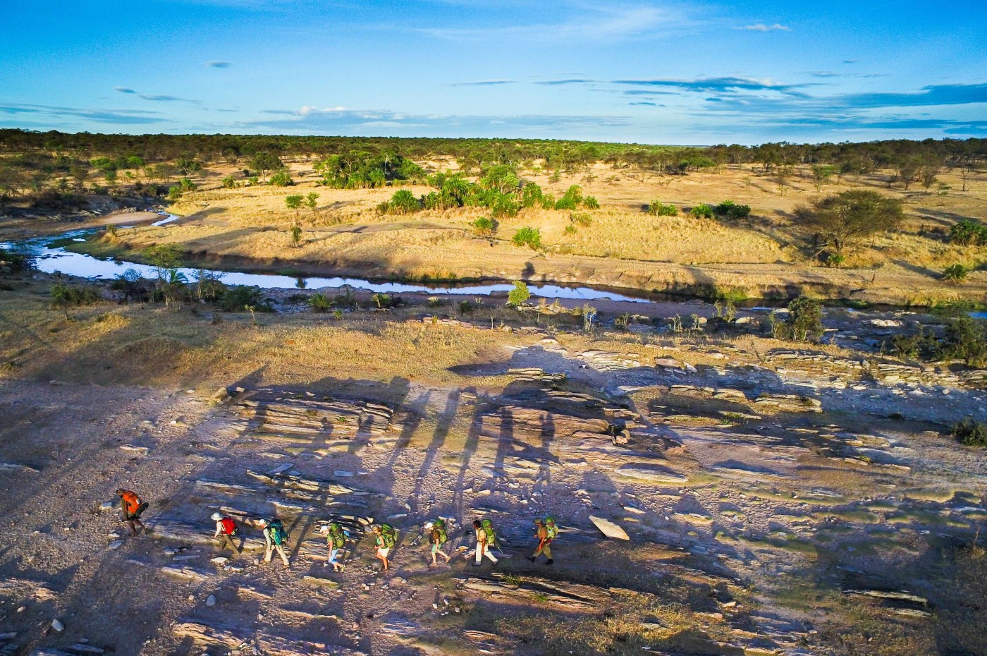 people walking on the savannah, Wayo Walking Safari Camp, Serengeti, Tanzania