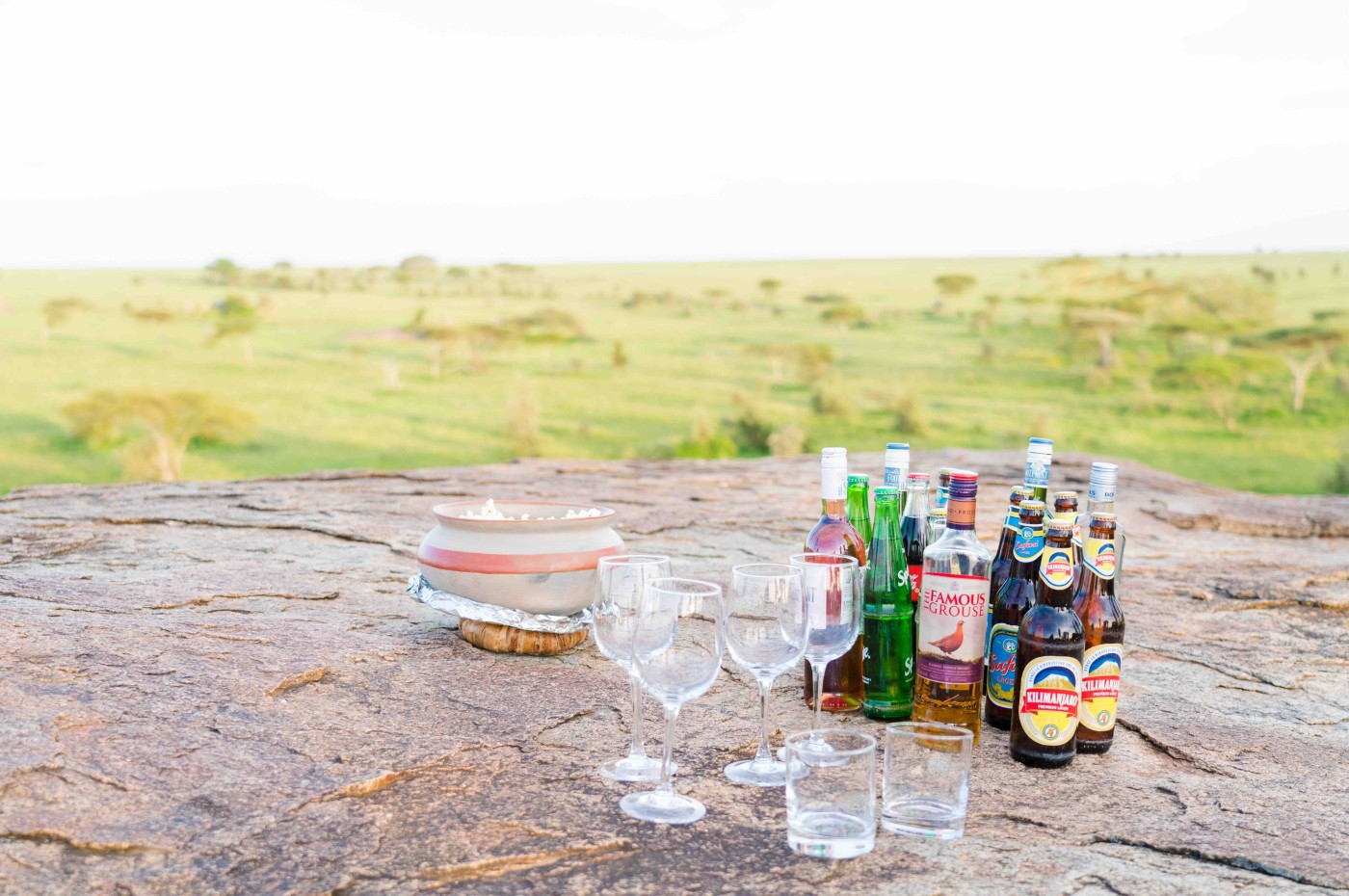 Drinks and glasses at the savannah at Wayo Walking Safari Camp, Serengeti, Tanzania
