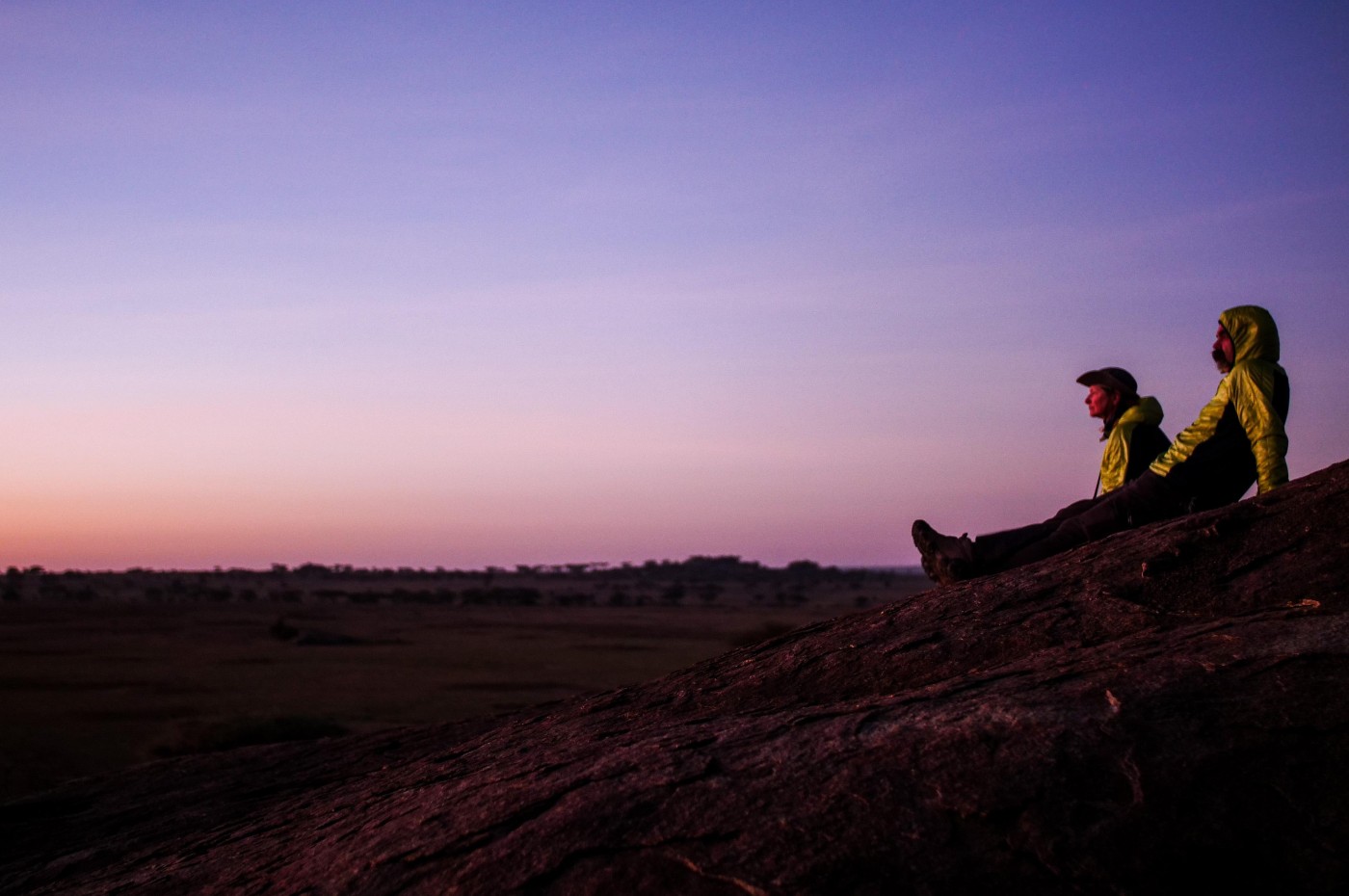 people looking at the sunset at Wayo Walking Safari Camp, Serengeti, Tanzania