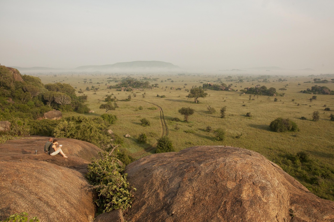 person looking over the savannah at Wayo Walking Safari Camp, Serengeti, Tanzania