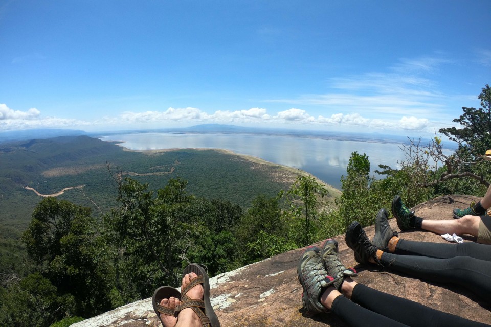 Feet and panorama photo of nature and Laka Manyara Tanzania